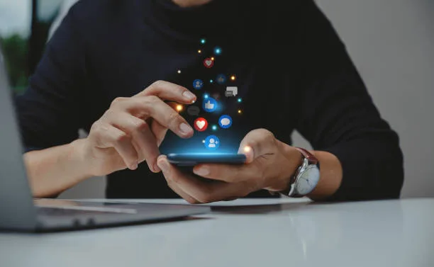 hand of young business using smartphone, social media concept